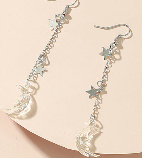 Silver Tone Resin Moon & Star Clear earrings E63
